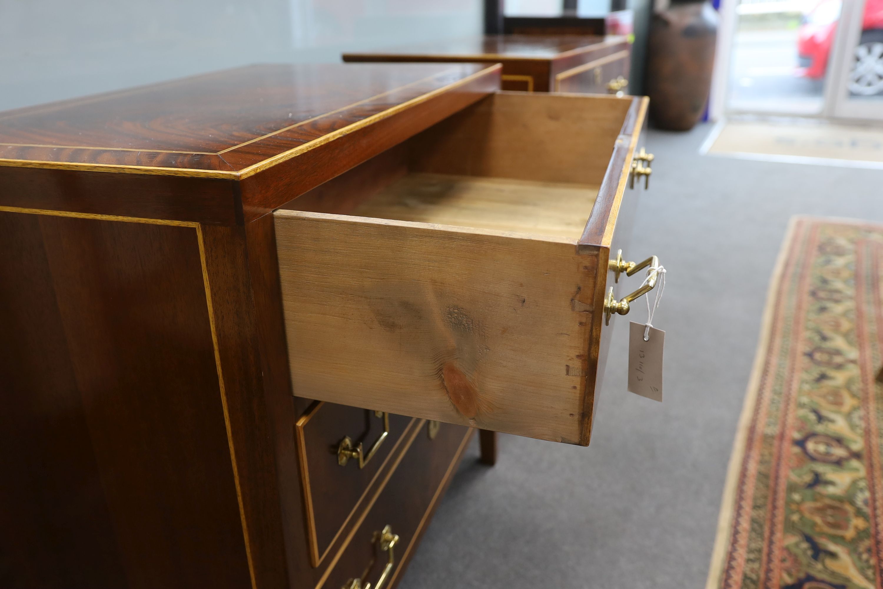 A pair of George IV style inlaid mahogany three drawer chests, width 79cm, depth 46cm, height 78cm
